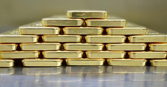 gold bars reuters 1200x630.jpg