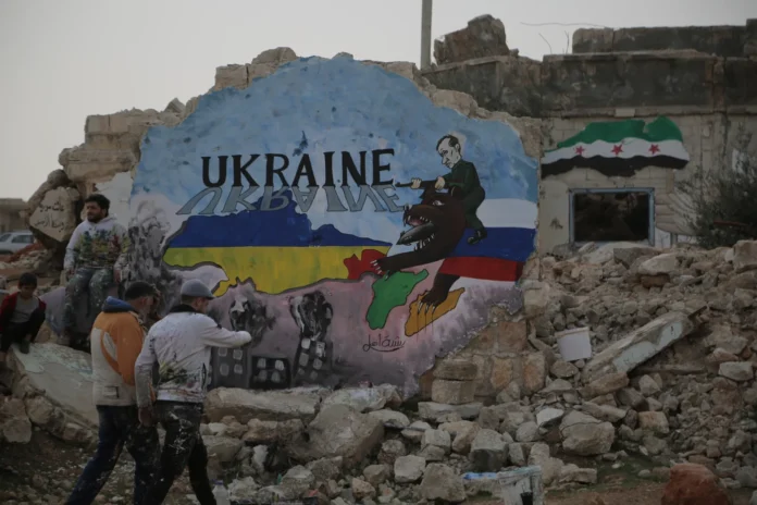 syria russia ukraine war murral.jpg.webp.webp