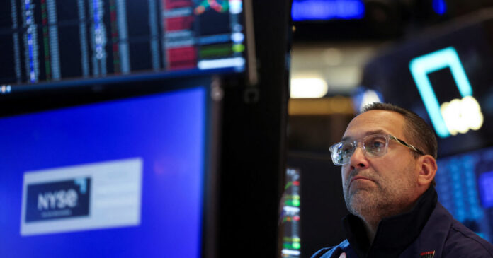 trader stocks nyse reuters 1200x630.jpg
