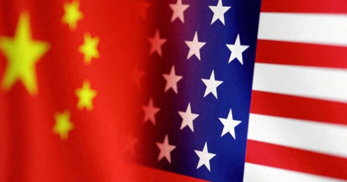 usa china flags reuters scaled 1 1200x630.jpg
