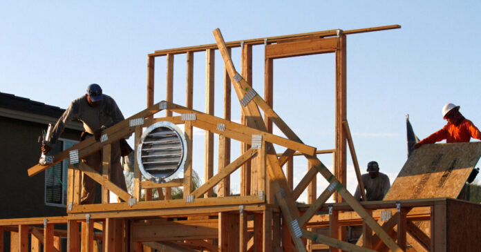 workers reuters 1200x630.jpg