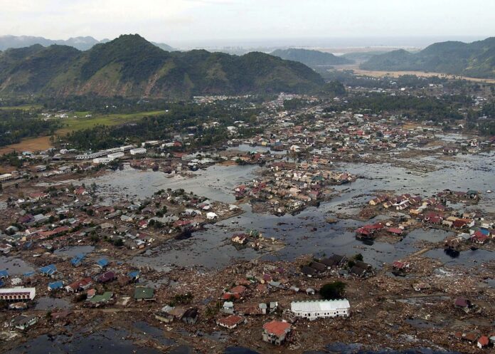 us navy 050102 n 9593m 040 a village near the coast of sumatra lays in ruin after the tsunami that s.jpeg