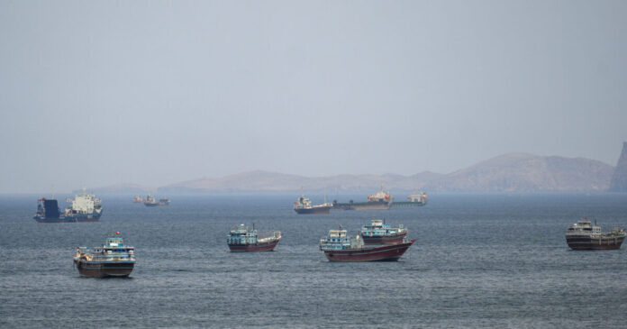 ships hormuz reuters 1200x630.jpg